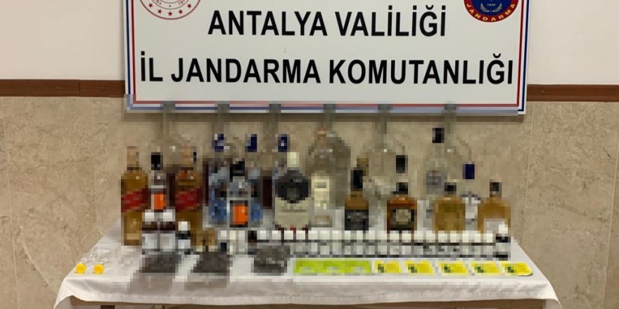 Evinde sahte içki üretirken yakalandı