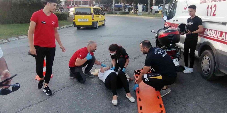 Kadın motosiklet sürücüsünü kaskı hayatta tuttu