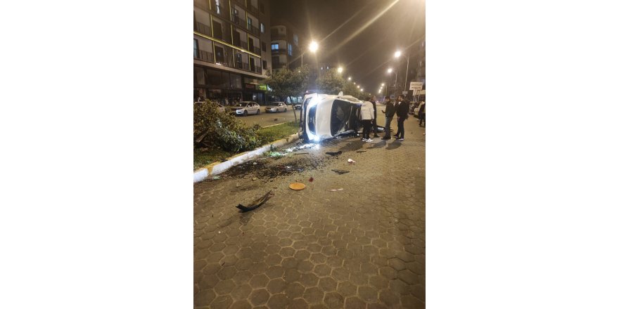Takla atan araçtan hafif yaralı kurtuldu