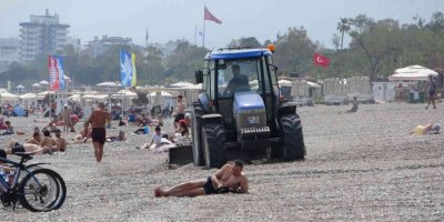 Dünyaca ünlü sahil, traktörlerle tarla gibi sürülüp sezona hazırlanıyor