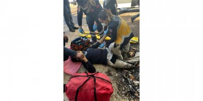 Tamir ettiği iş makinesinin altında kaldı