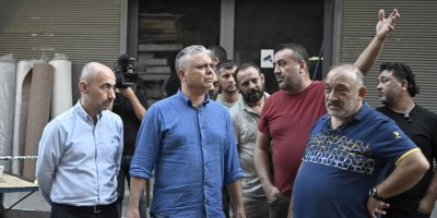 Başkan Uysal'dan esnafa geçmiş olsun ziyareti