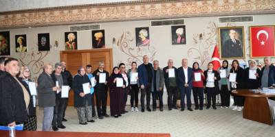 Aksu'da tapu dağıtımı sürüyor