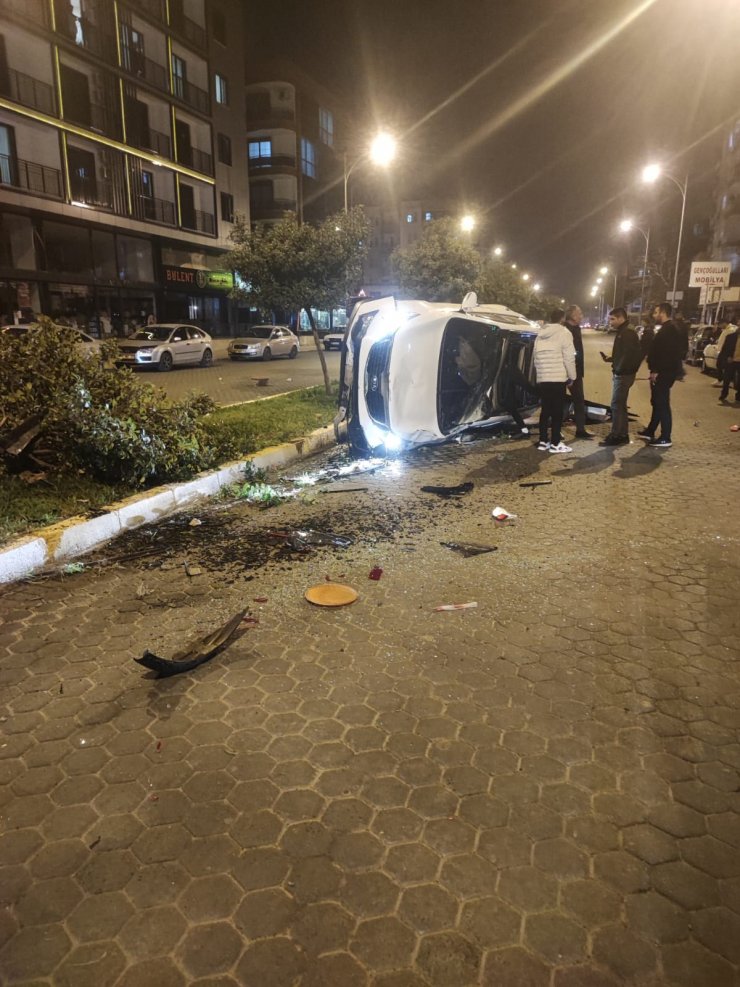 Takla atan araçtan hafif yaralı kurtuldu